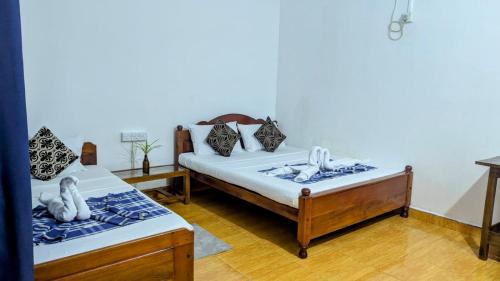 Standard Queen Room room in Gokanna Pearl Guest & Hostels