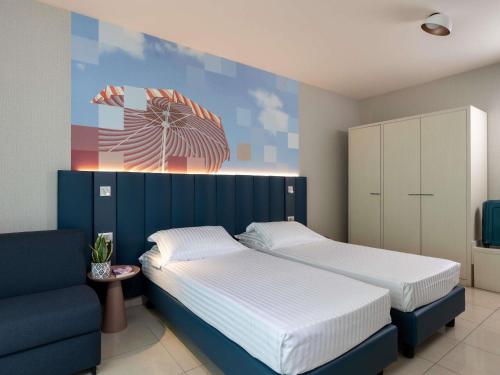 Superior Twin Room with Balcony and Side Sea View