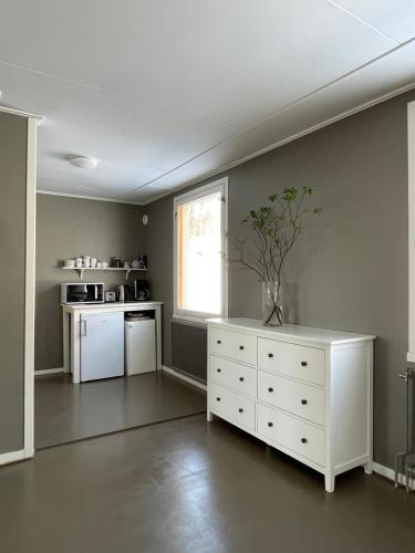 virtuve, AILU - Arctic Hotel Apartments in Lannavaara