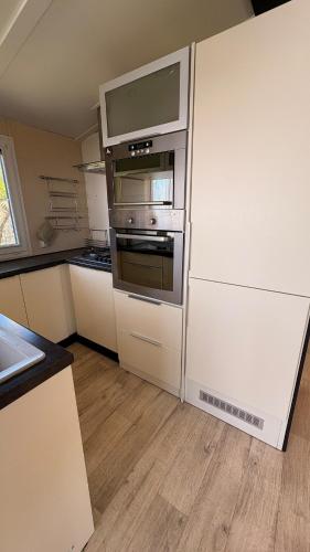 virtuve, Mobil home climatisé Louisiana 4 pers (Mobil home climatise Louisiana 4 pers) in Semussac