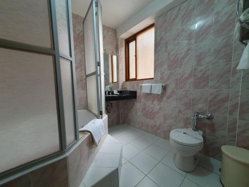 Badezimmer, Qelqatani Hotel in Puno