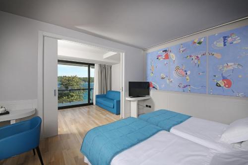 Junior Suite with Balcony and Lake View