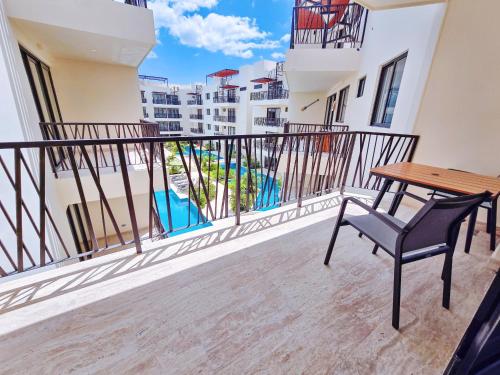 1 BedRoom with King Bed and Balcony with Amenities View - image 4