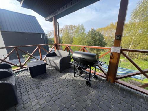 Brzozowe Wzgórze z jacuzzi i rowerami (Brzozowe Wzgorze z jacuzzi i rowerami) in Mieroszyno