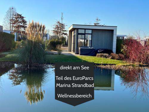 Ferienhaus 55 am Wasser Olburgen - perfekt für Familien - mit Freibad, Sauna, Restaurant und Spielplatz