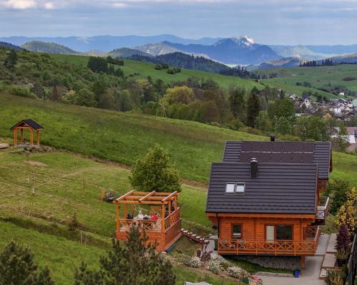 Buitenkant, Houten Vakantiewoning "ReisnaarPolen" royaal ontbijt, sauna en Hottub in Dursztyn