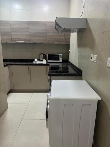 кухня, Marine Beach Apartment in Манама