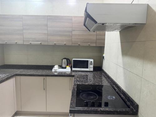 кухня, Marine Beach Apartment in Манама