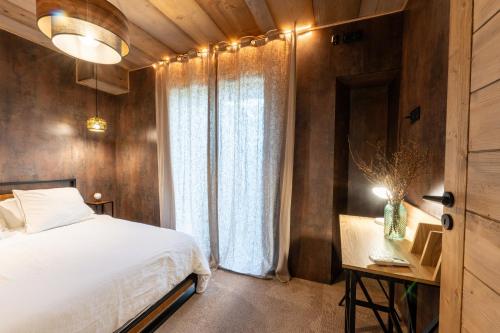 Appartement avec piscine & terrasse vue montagne in 塞諾德