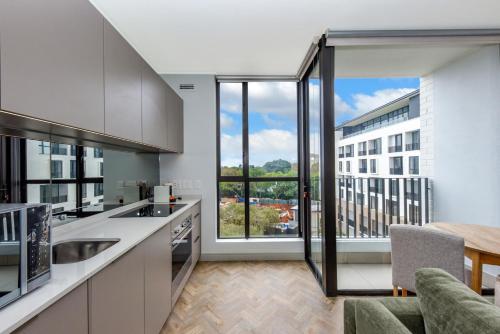 One-Bedroom Apartment with Balcony and City View image 10
