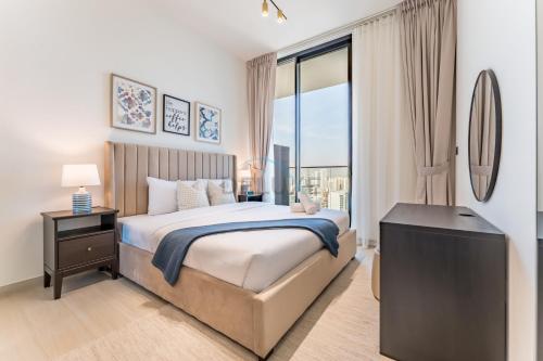 Skyline and Community Views 1BR, Near Mall and Community Park, Binghatti Onyx, Jumeirah Village Circle by Deluxe Holiday Homes, Dubái (foto 3)