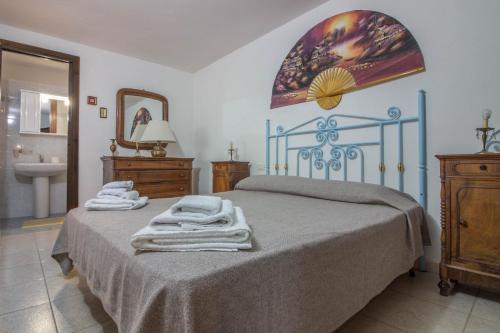 GuestHost - Cozy Flat with Garden & Parking, Porto San Paolo (fotografie 2)