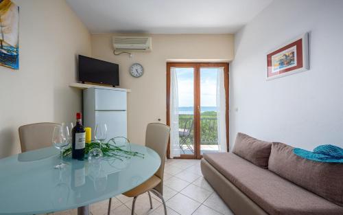 Two-Bedroom Apartment with Balcony and Sea View