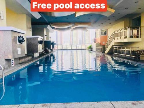 Birch Tower A8 Front of Robinson Mla BayFree Pool, Manila