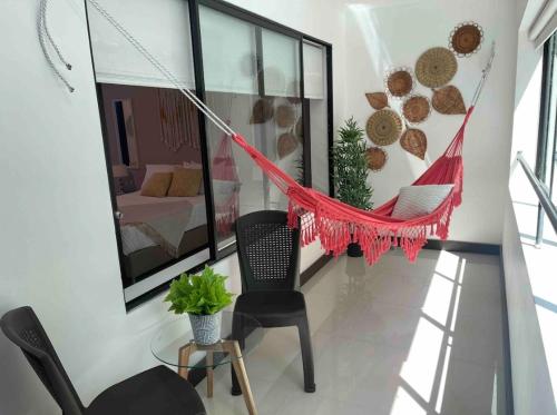 Apartamento con balcón y hamaca en zona rosa laureles 301, Medellín (photo 10)