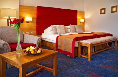 Deluxe Room Town View with King Bed room in Kempinski Hotel Grand Arena Bansko