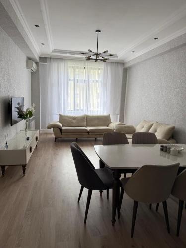 صالة مشتركة/ منطقة التلفزيون, Mart's 3 room apartment in Sumgait