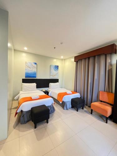 Superior Twin Room room in Holiday Suites Puerto Princesa