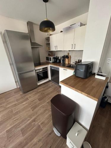 кухня, Superbe nid douillet 42m avec balcon et parking in Лонгвік