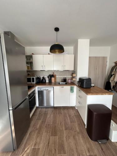 кухня, Superbe nid douillet 42m avec balcon et parking in Лонгвік