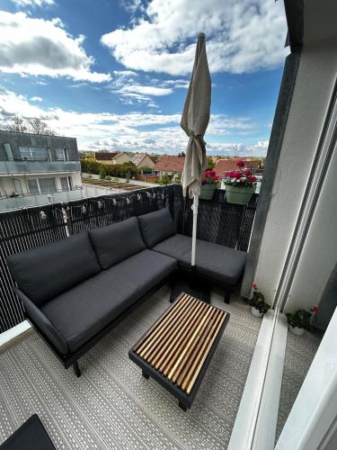 Балкон, Superbe nid douillet 42m avec balcon et parking in Лонгвік