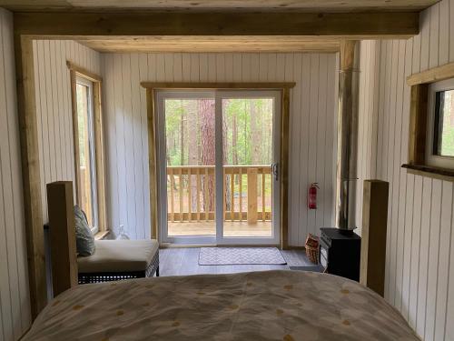 Treetops at Wildwoodz Off grid treehouse No electricity in Munlochy