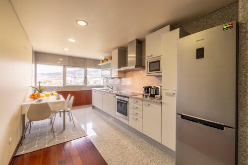 ห้องครัว, Panoramic City View Apartment - Guimarães (Panoramic City View Apartment - Guimaraes) in เครย์โซมิล