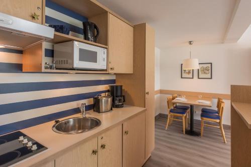 廚房, Ferienwohnung Seebär an der Seebrücke Zingst - ruhig gelegen mit Terrasse (Ferienwohnung Seebar an der Seebrucke Zingst - ruhig gelegen mit Terrasse) in 青斯特