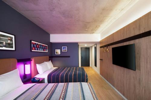 Standard Queen Room with Two Queen Beds and City View