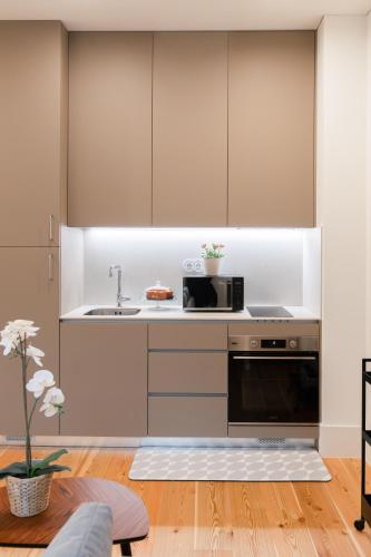 Kitchen, Plaza Apartments by HostWise in Costa