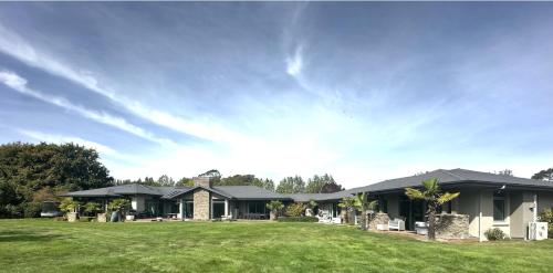 Exterior view, McSaveneys Retreat in Mairehau