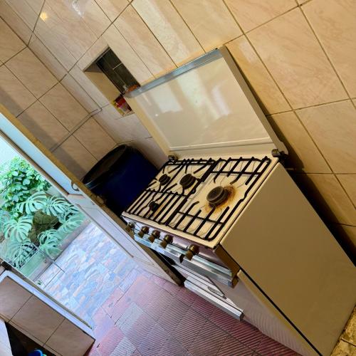 Kitchen, Habitacion centrica con acceso a lindo jardin in Cochabamba