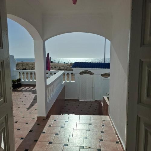 View, Maison de plage pied dans l'eau pour familles in Douar Sehamna