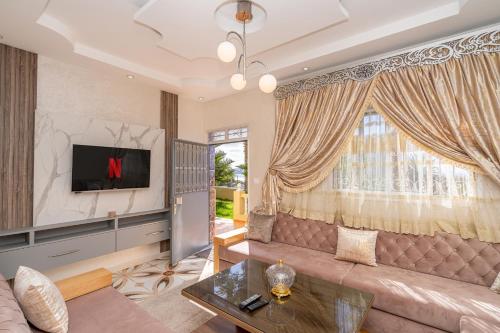 Magnifique appartement avec jardin en face de la mer in Mnar