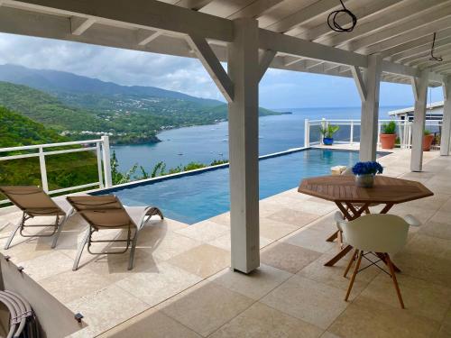 Villa Ozalee charme et élégance Vue panoramique sur la baie de Malendure et des spots de plongée (Villa Ozalee 5 etoiles charme et elegance Vue mer exceptionnelle sur la baie de Malendure et la rese) in Bouillante
