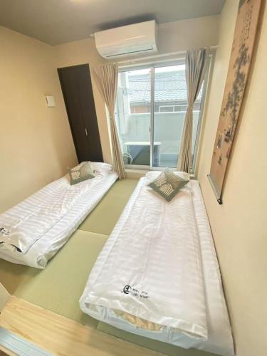 Sun生A号棟205室直达关西机场 电梯公寓 采光良好 仅2站到难波 直达梅田心斋桥天王寺 附带私人厨房, Osaka