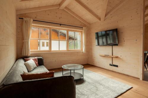Skupni salon/TV območje, Haus Bluntautal in Steghof