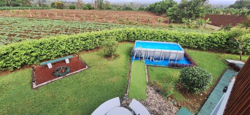 Arenal Nephelium Country Home, Refugio rural con piscina, jacuzzi y balcón con hermosas vistas al Volcán Arenal, en una finca privada, Fortuna (foto 9)