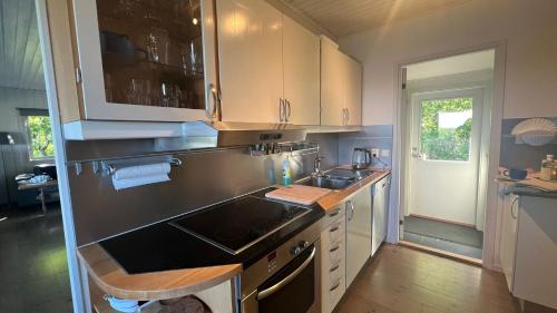 Cottage, boat, spa, private dock, Lillesand in Lillesand