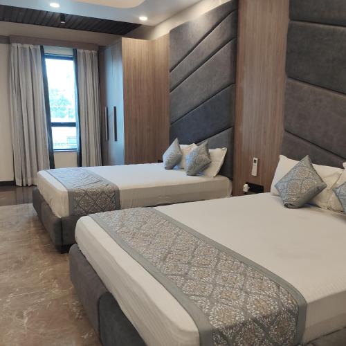 Tanwar Hotel & Restro in มันดาวา