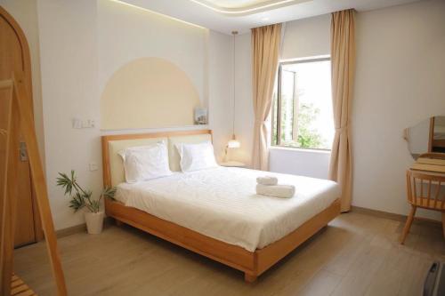 Di Home Homestay Hoi An, Hoi An (foto 7)