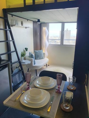 Elevated cozy loft studio - Tap to explore photos