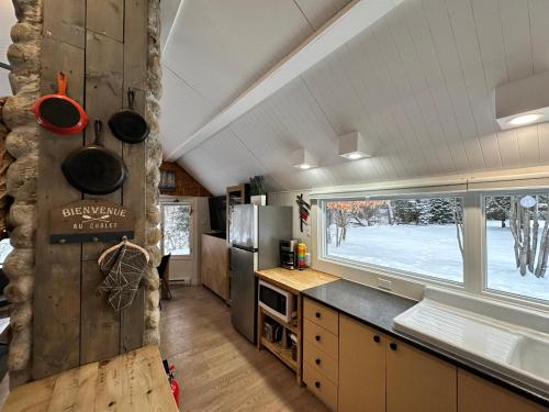 Le refuge de la petite rivière (Le refuge de la petite riviere) in แซ็ง-มาทิเยอ-ดู-ปาร์ก (QC)