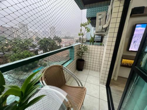 ระเบียง/ชานเรือน, Aconchego no Canto do Forte - Ar Condicionados - Tvs Grandes - Wi-fi e Estacionamento Incluso! in กันโตโดฟอร์เต