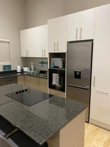 cuina, Sunset at 30 Nivica Luxury Apartment in Olifantskop