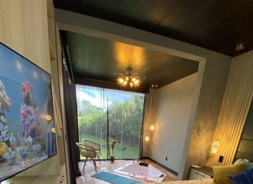 Cabana Romântica com Hidro (Cabana Romantica com Hidro) in กัมโป ลาร์โก