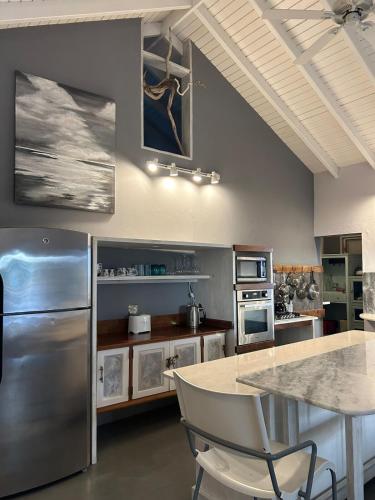 Moonrise Loft Two bedroom house each with en suite bathroom Five min drive to Falmouth Harbor in Freemans Village