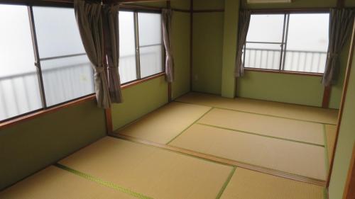 다나베 / 타나베 Aarons Guest House 3성급 게스트하우스 로비