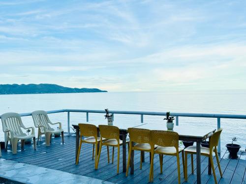 Balcony/terrace, Bohol Seafront Villa Pasan Cove a resort homestay in Guindulman
