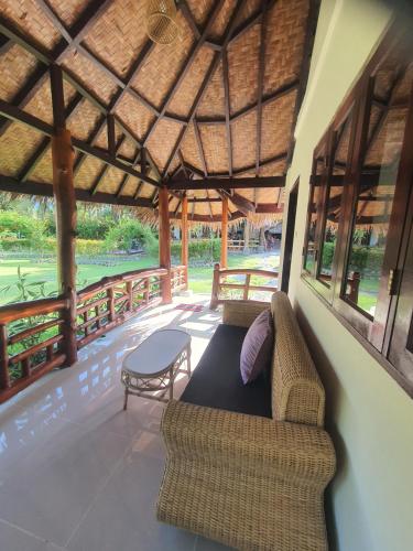 Balcony/terrace, Sumatra Cheeky Monkeys Villa, Trekking and Tours in Bukit Lawang